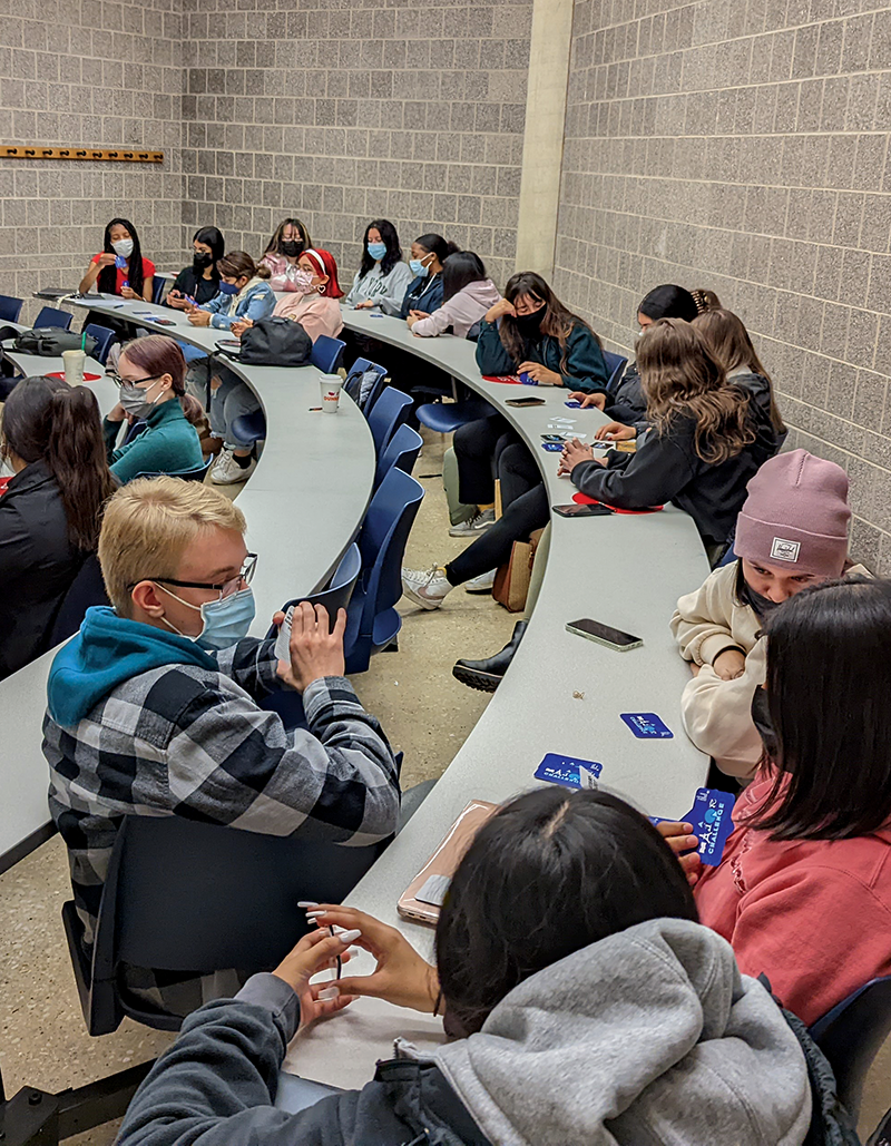 Students play the Major Challenge card game during an LAS 110 class session